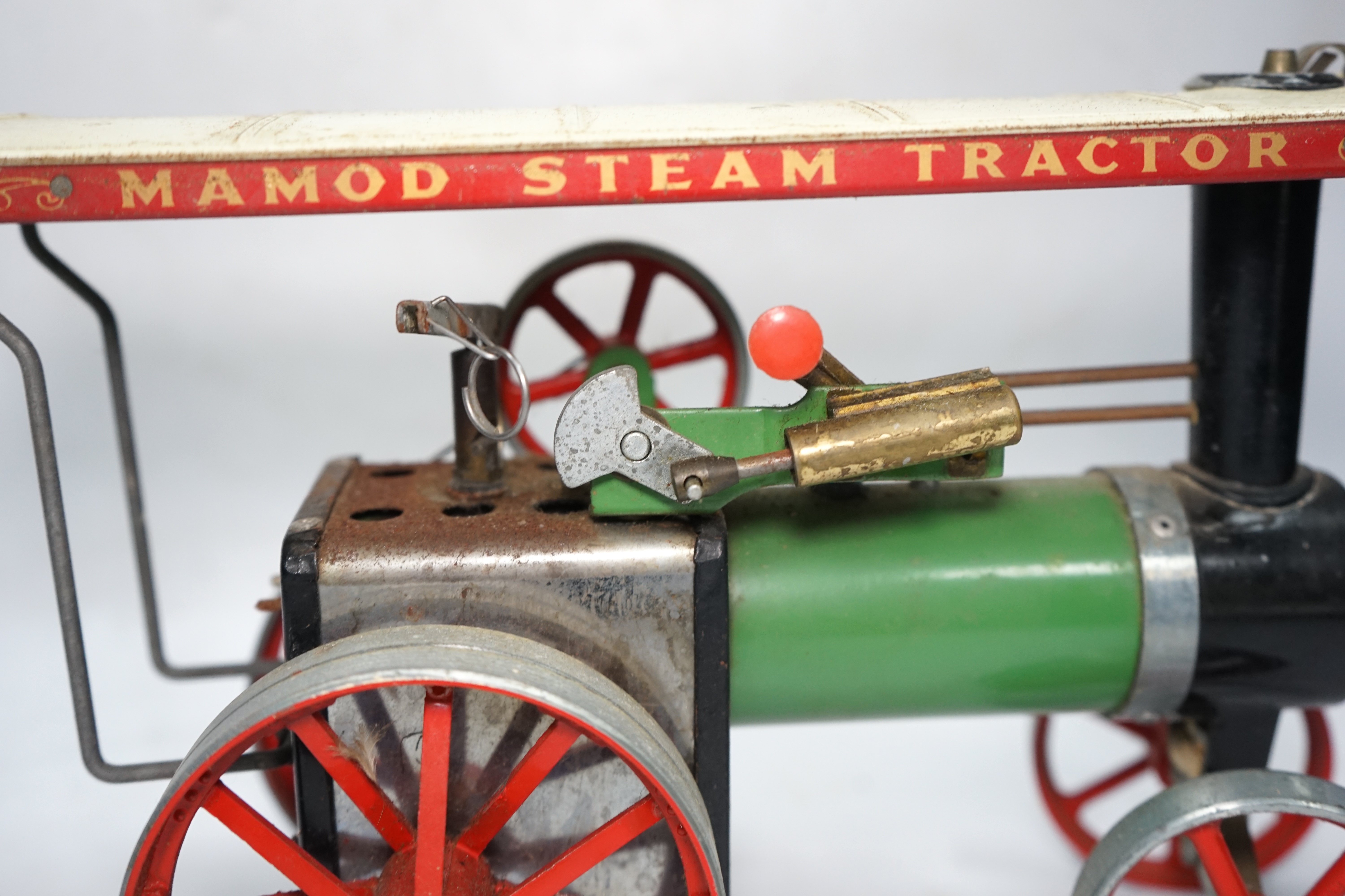 A Mamod live steam traction engine and a single cylinder stationary engine. Condition - poor to fair.